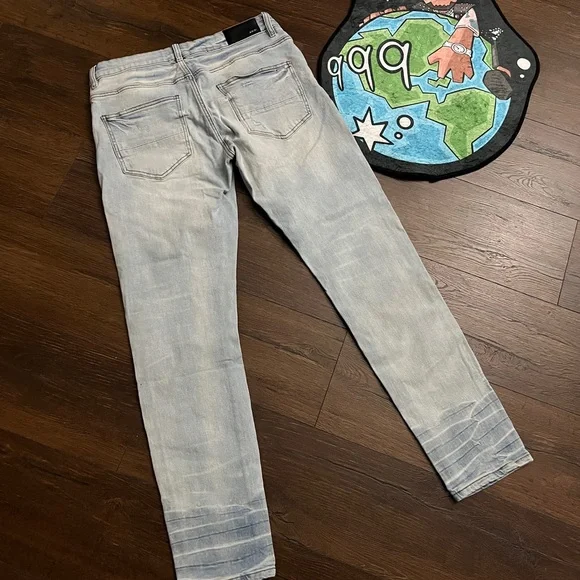 Amiri Light Wash Distressed Skinny Jeans